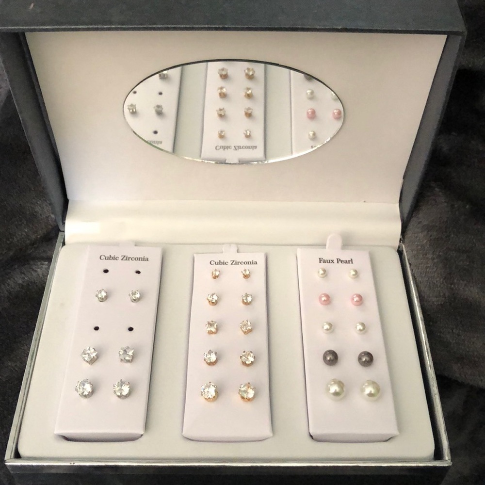 Studs and pearl earrings.